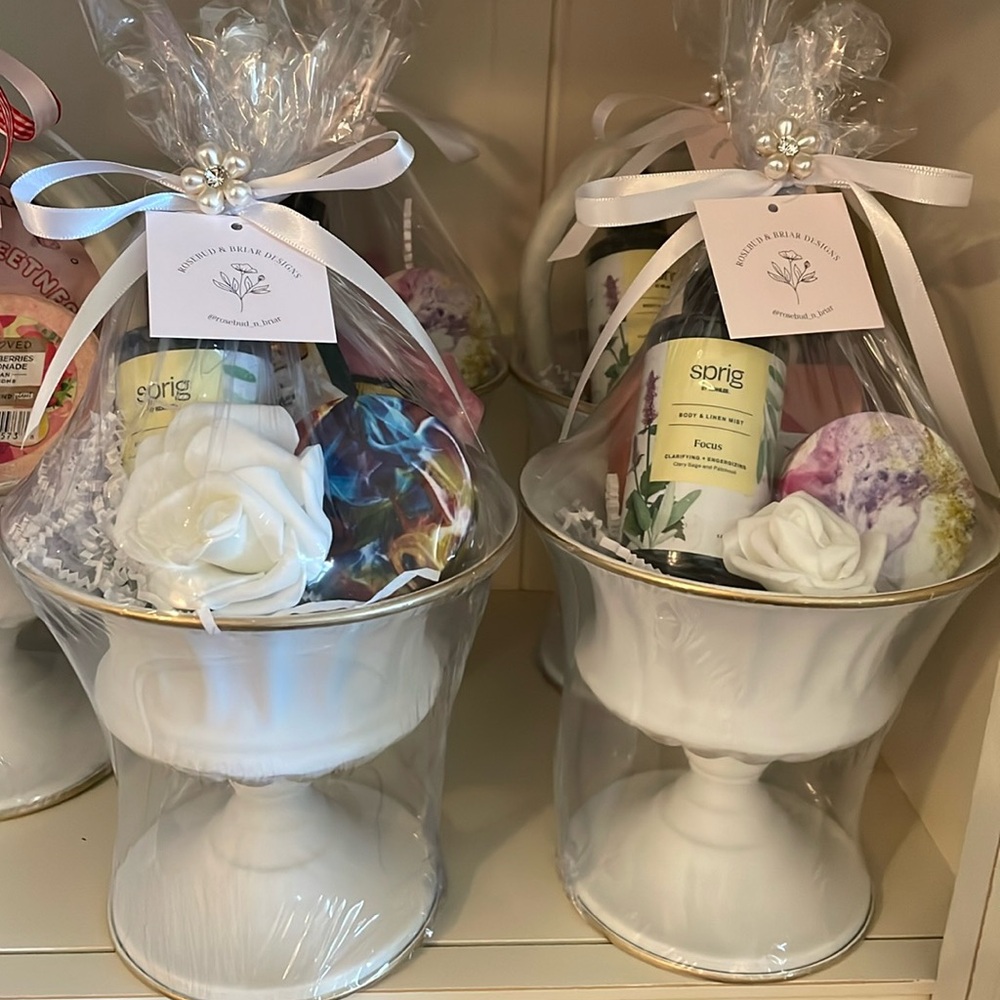 7. Sage and Patchouli Bath Gift Set in white and gold pedestal vase.